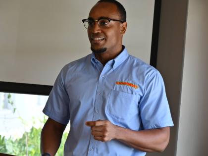 Clive Harris, group technical manager at Rainforest addressing scholarship recipients at the group’s headquarters in Montego Bay. 