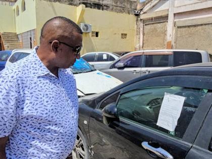 Mayor of Kingston Andrew Swaby at the car pound of the Kingston and St Andrew Municipal Corporation.
