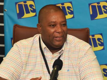 Director general of the International Centre for Environmental and Nuclear Sciences (ICENS), Professor Charles Grant, addresses a JIS Think Tank on August 20.