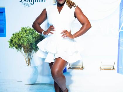 Red Stripe Spirits Trade Marketing Executive Chantalle Bryan puts a little bounce in the dress code, striking a playful pose for the lens.