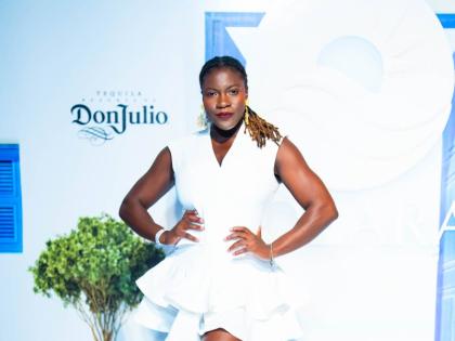 Red Stripe Spirits Trade Marketing Executive Chantalle Bryan puts a little bounce in the dress code, striking a playful pose for the lens.