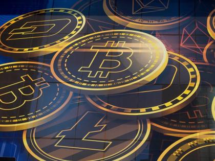 An advertisement for the cryptocurrency bitcoin is displayed on a building in Hong Kong in November 2021.  AP