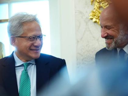 NVIDIA CEO Jensen Huang talks with Commerce Secretary Howard Lutnick as President Donald Trump speaks in the Oval Office of the White House about Dulles International Airport modernization, Wednesday, July 29, 2026, in Washington, USA. 