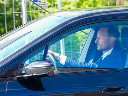 Norwegian Crown Prince Haakon drives a car on his way to the National Hospital in Oslo last Monday.