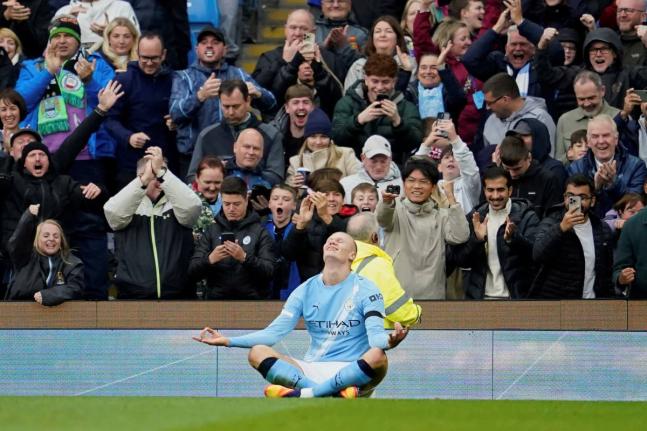 Manchester City's Erling Haaland celebrates after scoring during the Premier League football match between Manchester City and Manchester United in Manchester, England on September 14, 2025. 