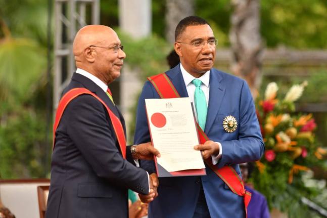 Governor General Sir Patrick Allen (right) with Prime Minister Dr Andrew Holness at King's House. Holness was sworn in on September 16. 