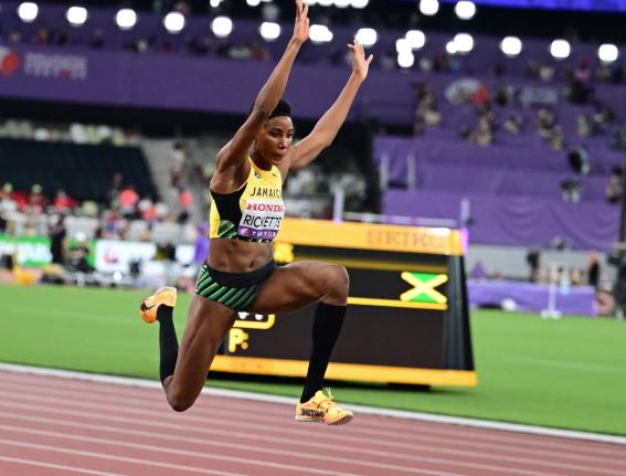 Shanieka Ricketts competing in the women’s triple jump qualification round at the World Athletics Championships inside the Japan National Stadium in Tokyo yesterday. 