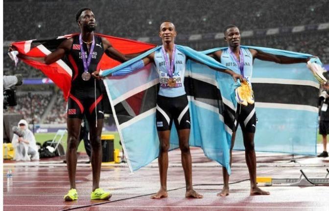 Trinidad and Tobago’s Jereem Richards (left), silver medallist in the men’s 400 metres at the 2025 World Athletics Championships with gold medallist Busang Kebinatshipi of Botswana and bronze medallist Bayapo Ndori, also of Botswana.