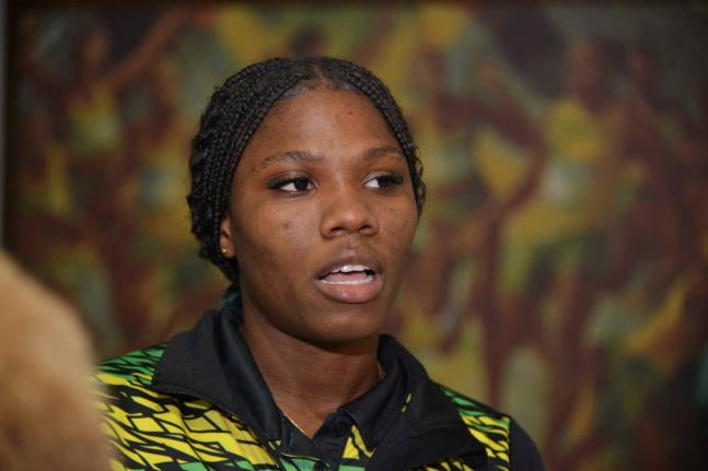 Roxonna McLean,  captain of the national under-21 netball team, at the Norman Manley International Airport on Wednesday, shortly after the players returned home from the Netball World Youth Cup in Gibraltar.