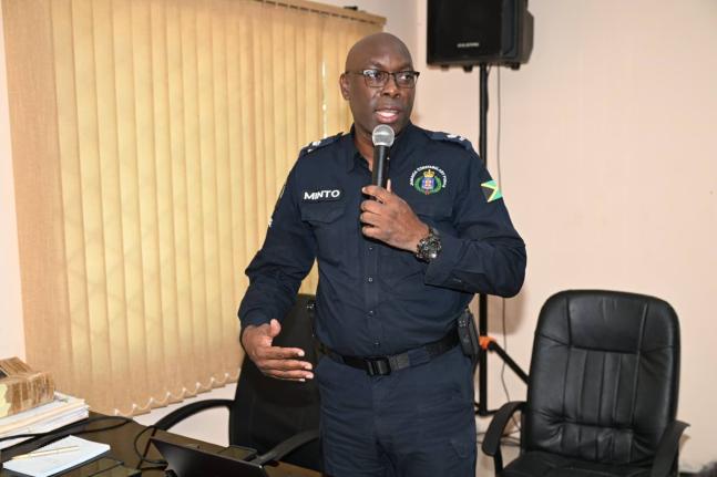 Commanding Officer for the St Elizabeth Police Division, Superintendent Coleridge Minto, addressing the recent monthly meeting of the St Elizabeth Municipal Corporation in Black River.