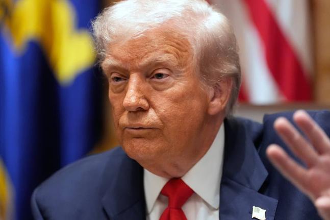 President Donald Trump speaks during a meeting with Argentina's President Javier Milei in the Cabinet Room of the White House, Tuesday, October 14, 2025, in Washington. (AP Photo/Alex Brandon)