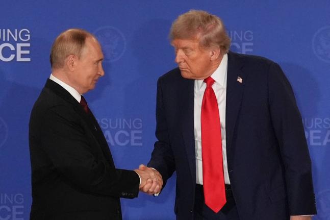 
US President Donald Trump (right) shakes the hand of Russia’s President Vladimir Putin during a joint press conference at Joint Base Elmendorf-Richardson, Alaska, on August 15, 2025.