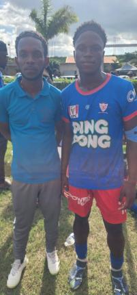 Kemps Hill’s coach Kiegon Mitchell (left) with Shamar Daley, one of his top players.