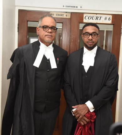 Attorneys-at-law Kevin Powell (right) and Pierre Rogers after being appointed to the Inner Bar at a ceremony at the Supreme Court on October 21.