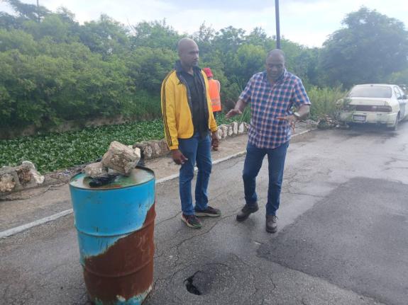 Member of Parliament for St Catherine South Eastern, Dr Alfred Dawes (left) and Councillor for the Waterford Division Fenley Douglas during a visit to the community of Waterford ahead of the passing of Tropical Storm Melissa.