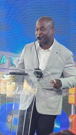 Shane Munroe, CEO, MBJ Airports Limited, addressing travel advisers and other tourism stakeholders at the Sandals ‘Back to Jamaica’ Town Hall at Sandals Dunn’s River in St Ann on Friday.