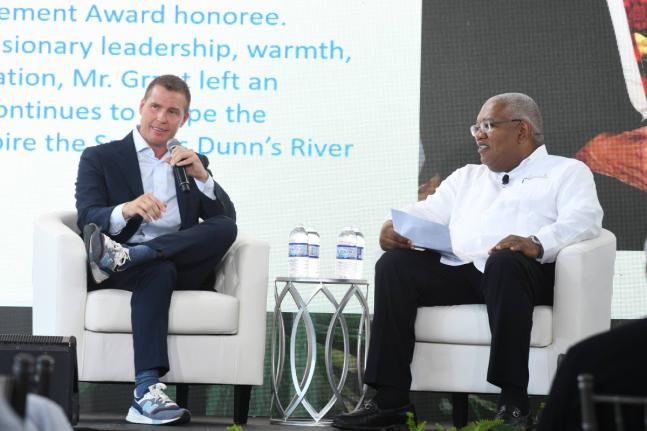 Executive Chairman of Sandals Resorts International Adam Stewart (left) responds to questions posed by Unique Vacations’ Executive Vice-President of Sales and Industry Relations, Gary Sadler, during the Sandals ‘Back to Jamaica’ forum on Friday at Sa