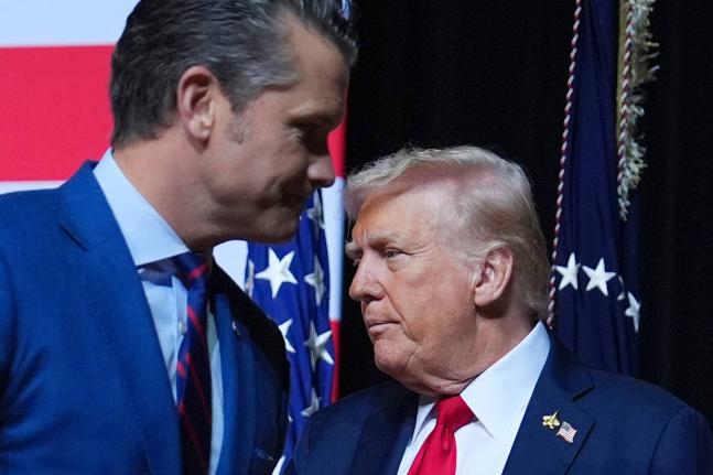 US President Donald Trump (right) and Secretary of Defense Pete Hegseth.