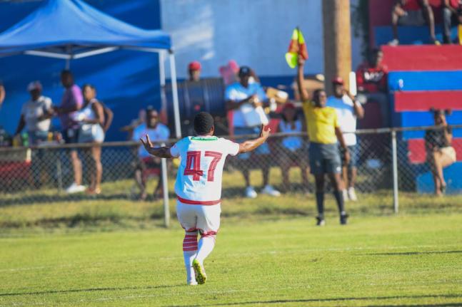 Matthew McKoy/Photographer 
Portmore United’s Tarick Ximines questions a referee’s decision to signal offside during a Jamaica Premier League against Arnett Gardens at Ferdi Neita Park on December 7.