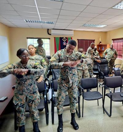 Members of the Jamaica Defence Force Health Services Corps participate in a psychological first aid training session conducted by a team of psychologists from Northern Caribbean University (NCU) at Up Park Camp in St Andrew on November 28. 2025. The initia