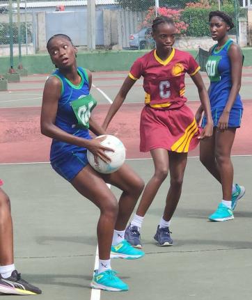 Action in the junior ISSA Urban Netball Competition final at thee St Andrew’s High School for Girls yesterday.