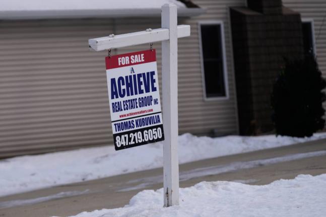 AP 
A “For Sale” sign is displayed in front of a home in the USA Monday, December 15, 2025.