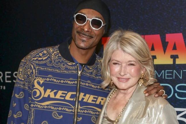 Snoop Dogg (left) and Martha Stewart attend the Footwear News Achievement Awards at Cipriani South Street on Wednesday, November 29, 2023, in New York. 