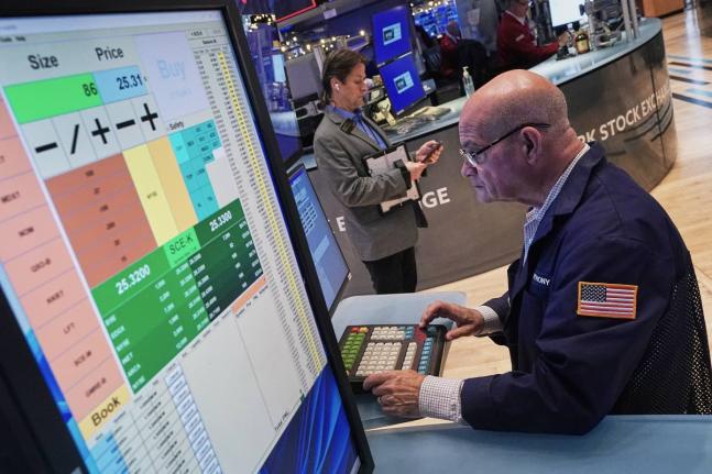 AP
Trader Anthony Confusione works on the floor of the New York Stock Exchange, Thursday, December 11, 2025.