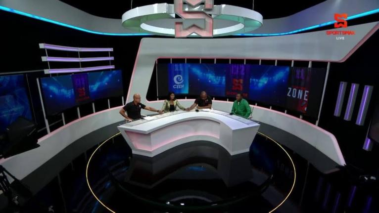 
The SportsMax set on its final day of operation. Pictured are from left: Lance Whittaker, Mariah Ramharack, the late Donald Oliver, and Ricardo Chambers. 