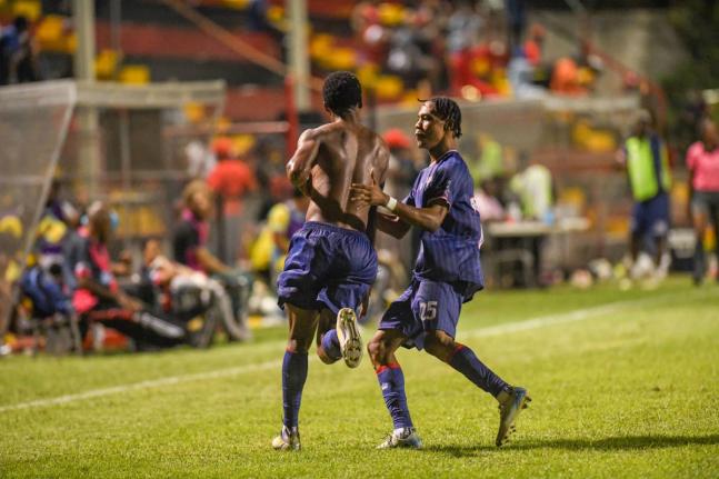 
Spanish Town Police FC teammates Diamond Clarke (left) and Devontay Ricketts celebrate the former’s goal against Waterhouse during a Jamaica Premier League match at the Anthony Spaulding Sports Complex on December 15, 2025. 