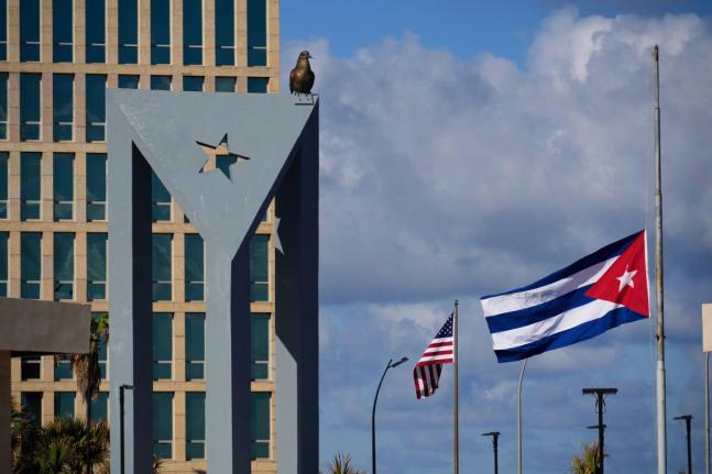 The Cuban flag flies at half-mast at the Anti-Imperialist Tribune near the US embassy in Havana, Cuba, Monday, January 5, 2026, in memory of Cubans who died two days before in Caracas, Venezuela during the capture of Venezuelan President Nicolas Maduro by 
