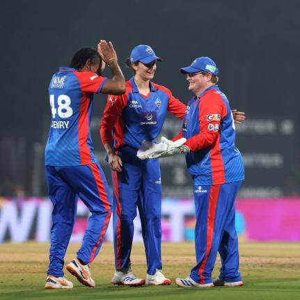 Delhi Capitals’ Chinelle Henry (left) and wicketkeeper Lizelle Lee (right) celebrate a wicket during a Women’s Premier League T20 cricket match against the Gujarat Giants at the Dr DY Patil Sports Academy on Sunday.
