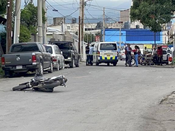 A police cordon along Grove Road in St Andrew on January 21, 2026. A would-be robber shot by licensed firearm holder.