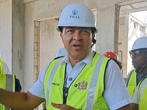 Minister of Health and Wellness Dr Christopher Tufton speaking with the reporters  following a tour of expansion works at the Greater Portmore Health Centre in St Catherine on January 28.