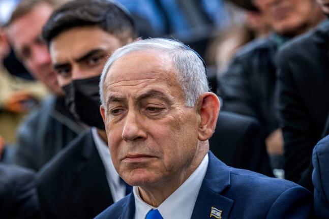 Israel's Prime Minister Benjamin Netanyahu reacts during the funeral of Israeli hostage Ran Gvili, whose remains were brought back to Israel, in the southern town of Meitar on January 28, 2026.