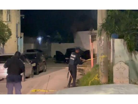 Police cordon a section of Waltham Park Road in St Andrew on February 10 following a shooting that left a soldier dead. 