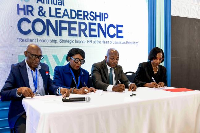Minister of Labour and Social Security, Pearnel Charles Jr. (2nd right); Acting Permanent Secretary in the minstry, Dione Jennings (right); President of the Human Resource Management Association of Jamaica (HRMAJ), Dr Cassida Jones Johnson (second left) an