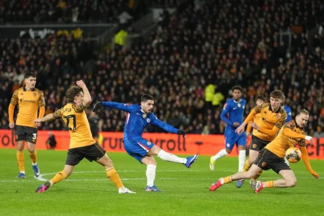Chelsea’s Pedro Neto shoots during the English FA Cup fourth round soccer match between Hull City and Chelsea in Hull, England, Friday, February 13, 2026.  