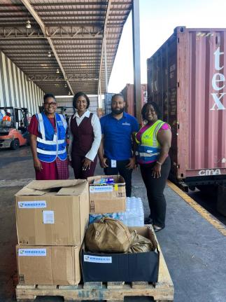 The Biomedical Caledonia Laboratory team recently made a donation to charity organization, Food For The Poor (FFP) in support of the Hurricane Melissa relief efforts. Here, Marsha Burrell Rose (left), FFP’s development & marketing manager accepts the don