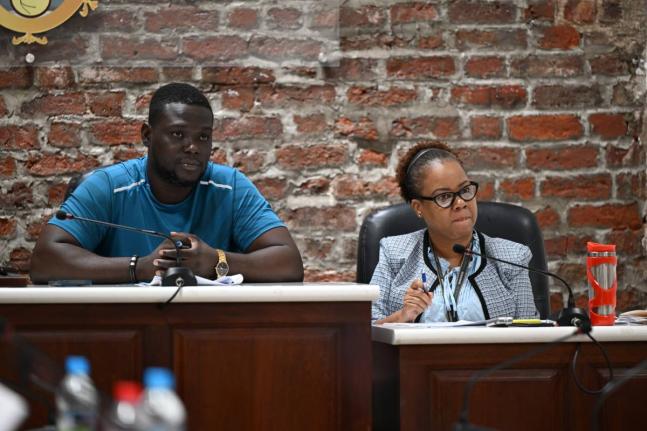 Councillor for the Oracabessa Division in St Mary, Ramon Henry (left), chairs the Public Health and Sanitation Meeting of the St Mary Municipal Corporation on February 24. At right is Chief Executive Officer, Ethlyn Douglas.