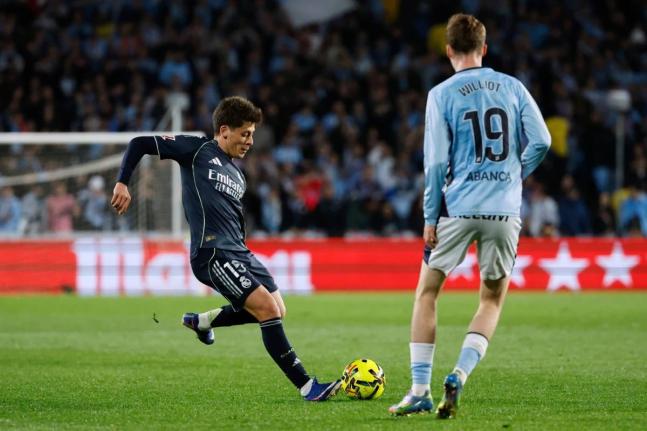 Real Madrid’s Arda Guler (left) moves to take a shot as Celta Vigo’s Williot Swedberg looks on during their Spanish La Liga in Vigo, Spain yesterday.
