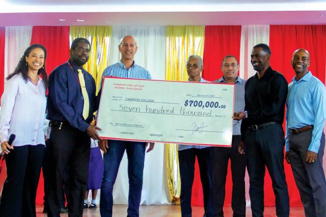 Campion College principal Dr Lavare Henry (second left) and master chemistry teacher Radley Reid (fourth right) with alumni Rita Coore‑Widener (left), Zachary Harding (third left), Dennis Oliver (third right), Richard Grey (second right) and Dave Garcia 
