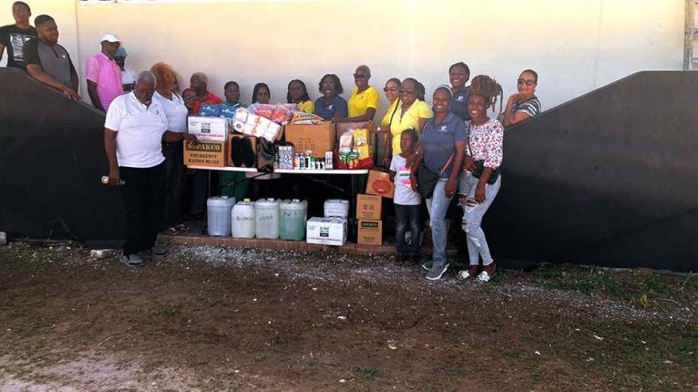 Members of the JN Circle Ocho Rios, Port Maria and Gayle chapters, along with the JN Circle Falmouth Chapter, pause for a group photo after presenting donations to Noah’s Ark Children’s Home and the Falmouth Infirmary in Falmouth. The contributions inc