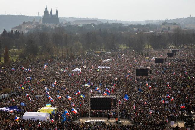 People gather to take part in a large anti-government protest in Prague, Czech Republic.