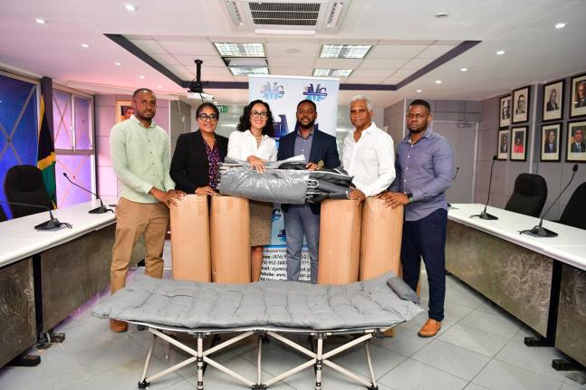 Lisa Lake, group chief executive officer of Restaurant Associates Limited (RAL), and Michael Lake, director, are joined by the Mayor of Montego Bay, Richard Vernon, and representatives of the St James Municipal Corporation during the official handover of 1