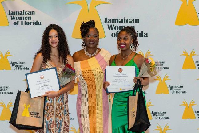 Michelle Williamson, outgoing JWOF president, is flanked by student awardees, Kylin Reynolds (left) and Abigail Jacquette.