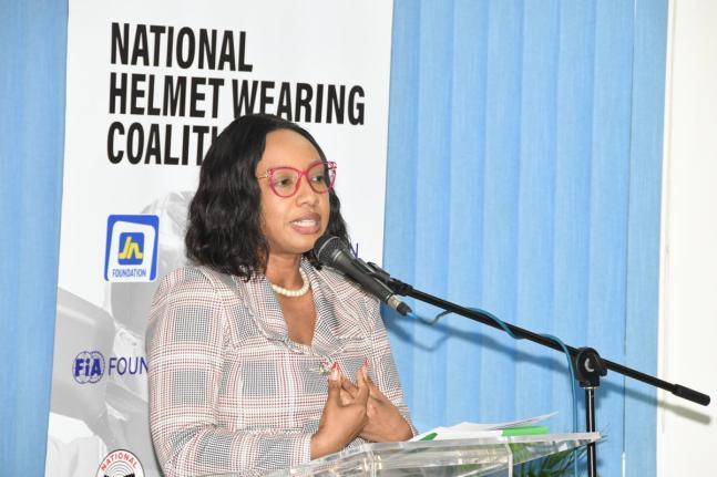 Sydoney Preddie, lead for Youth and Education Programme, JN Foundation, addressing the launch of a new national standard for helmets worn by motorcyclists at the Jamaica Business Development Corporation Incubator and Resource Centre in Kingston, recently.