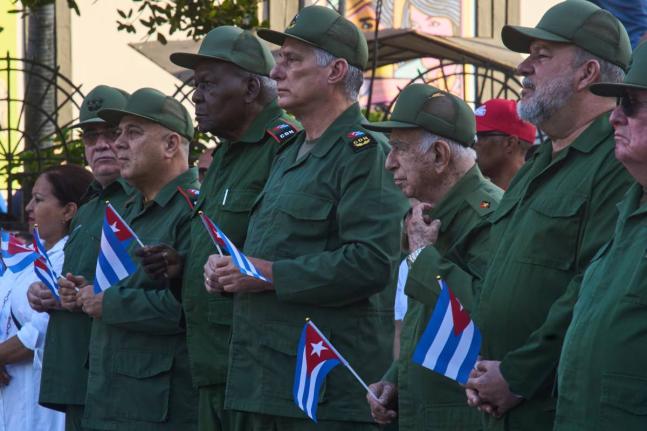 Cuban President Miguel Diaz-Canel, centre, attends a celebration marking the 65th anniversary of the proclamation declaring the Cuban Revolution socialist, in Havana, Cuba, Thursday, April 16, 2026. (AP Photo/Ramon Espinosa)