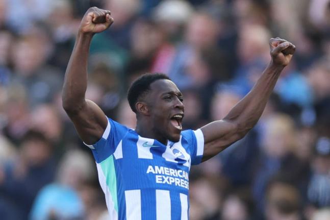
Brighton’s Danny Welbeck celebrates after scoring during the English Premier League football match against Liverpool in Brighton, Saturday, March 21.