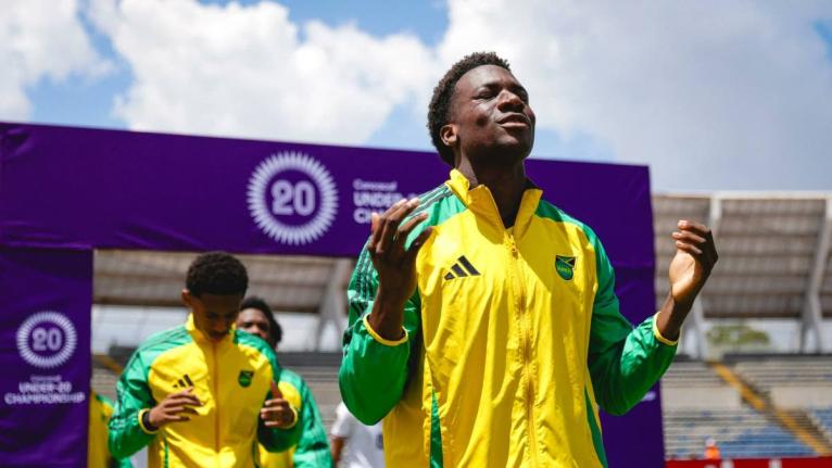 
Jamaica’s U20 players enter the field ahead of their Concacaf U20 Championship football game against Canada yesterday.